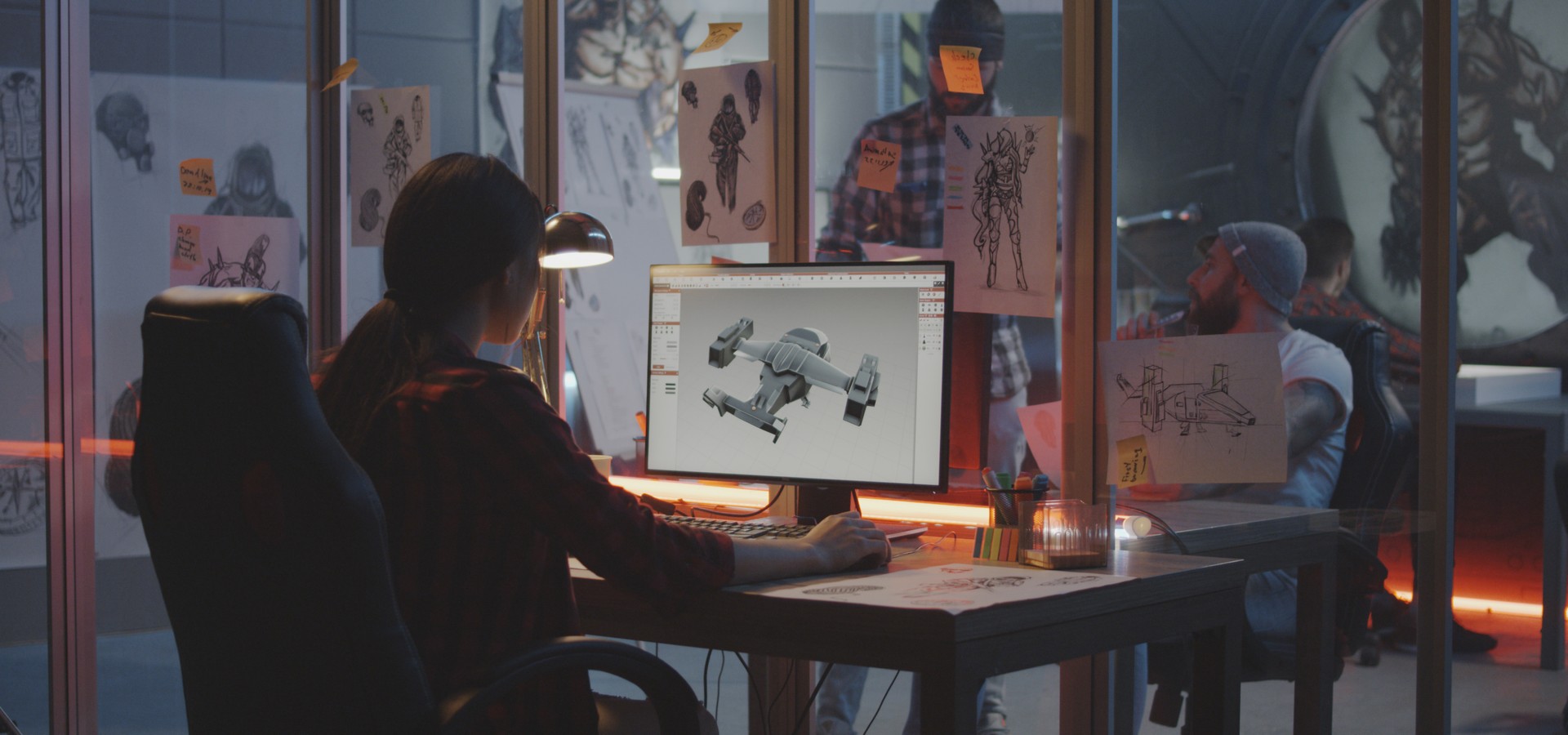 Woman modeling an airplane on computer